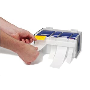 Skillevegg til etikettdispenser